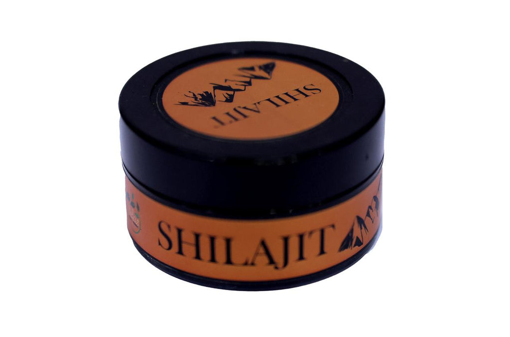 Jar of Shilajit with black lid on a white background