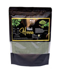 Bag of black henna powder with visible branding on a white background